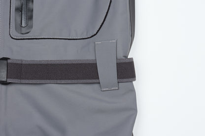 Close-up of BRIVER wader waist featuring heavy-duty reinforced belt loops and a durable nylon wading belt for a secure fit.
